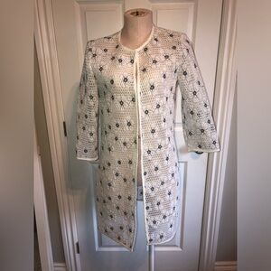 Jeanne Beker White and Black crochet-like Coat